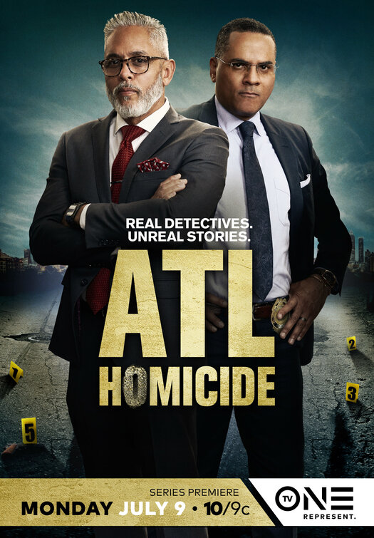ATL Homicide detectives posed in front of the Atlanta skyline.